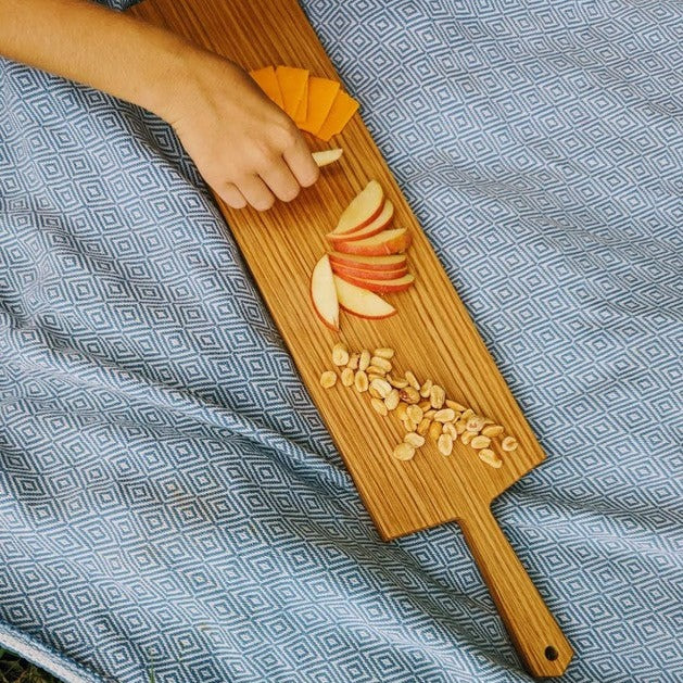Wooden Charcuterie Board with appetizer on table