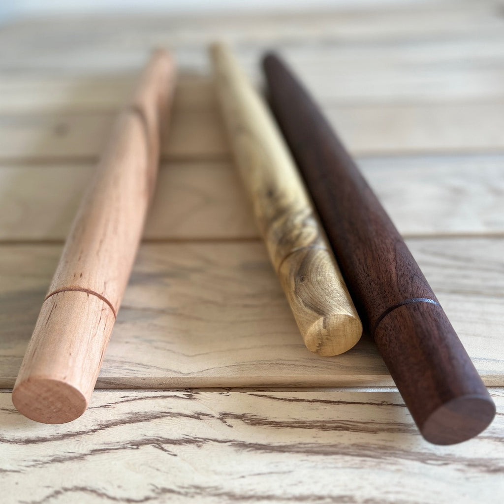 Tapered French Wood Rolling Pins on Wood Countertop