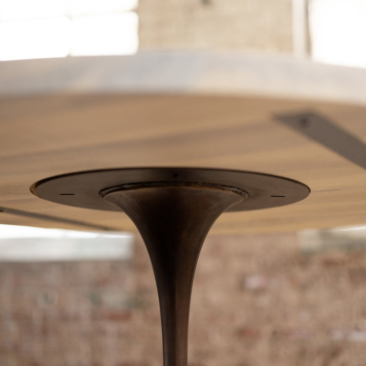 Round Wood and Bronze Pedestal Base Dining Table Bottom of Table