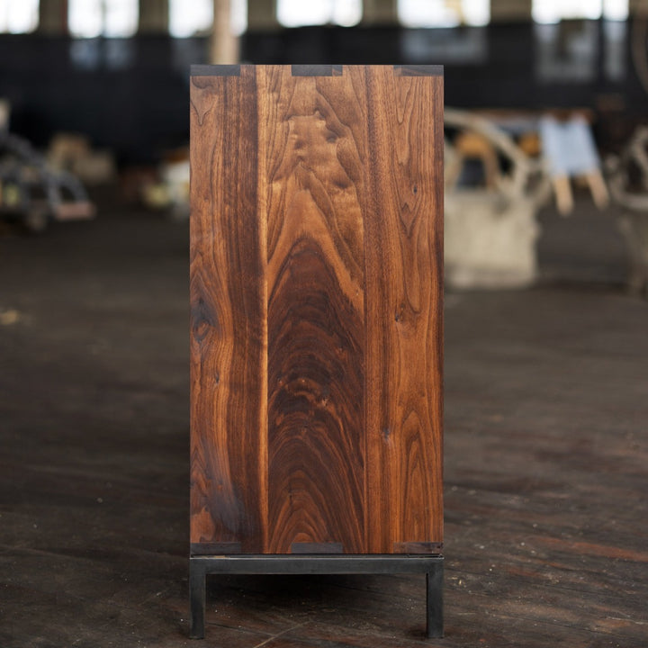 solid wood credenza for record storage end view walnut