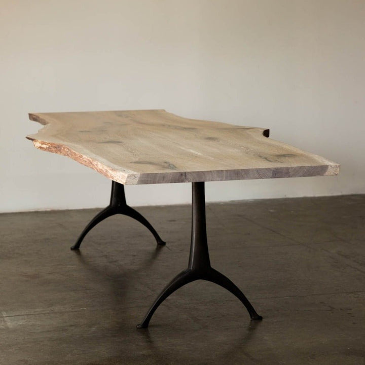 live edge wood dining room table with cast iron legs