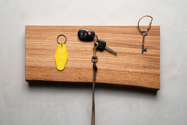 Magnetic Wooden Knife Holder holding kitchen knives