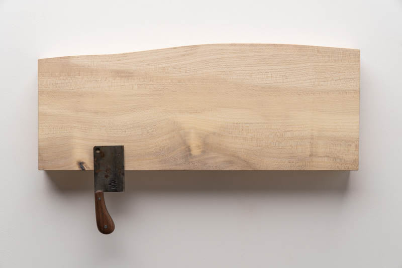 Magnetic Wooden Knife Holder in light grain holding a kitchen knife