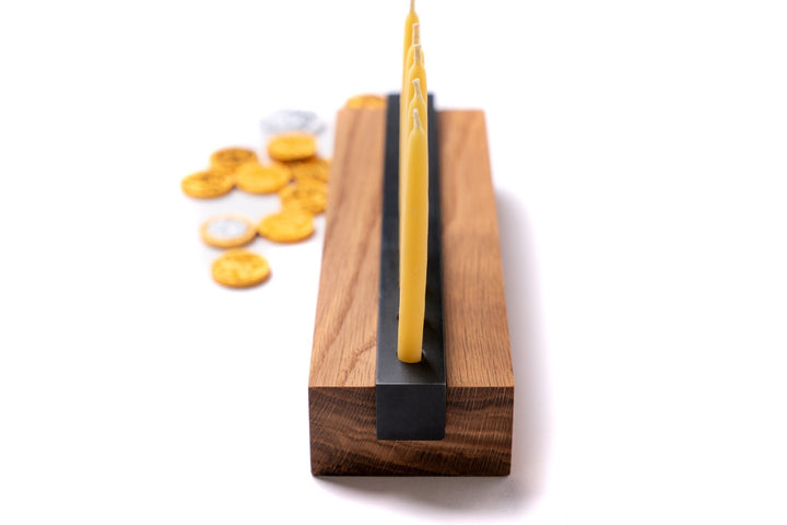 Wood and Steel Menorah with yellow candles and gold coins