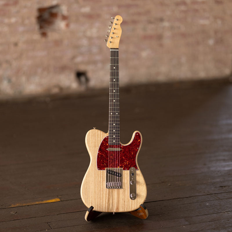 How did Custom Stickers assist Alabama Sawyer with the Sawyer Model A Guitar?