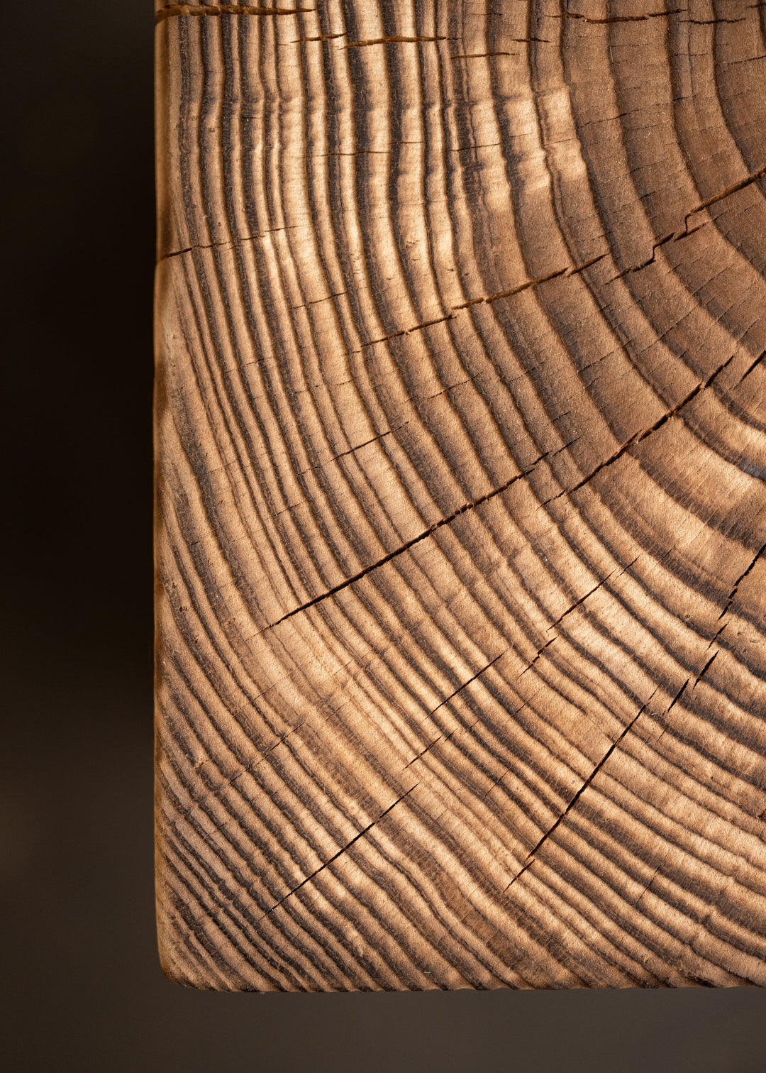 Close-up of a wooden surface of a wood cube side tablewith visible grain and texture