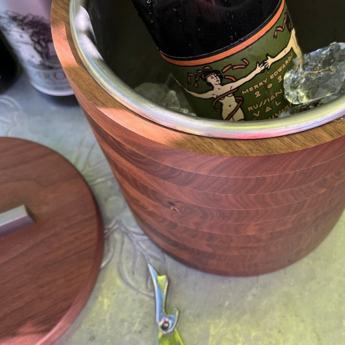 Modern Wooden Ice Bucket in Walnut pictured from above holding a bottle of wine