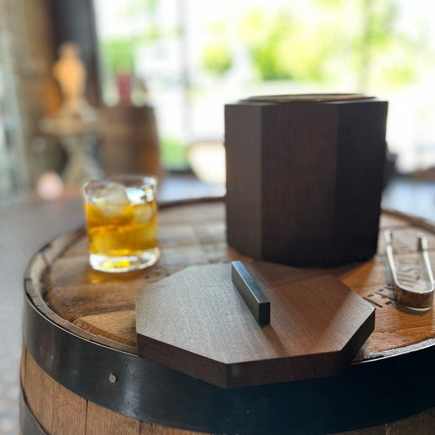 Wooden Ice Bucket shown from the side with bourbon