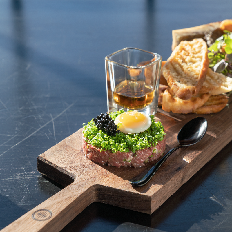 Long Charcuterie Board with handle serving appetizers