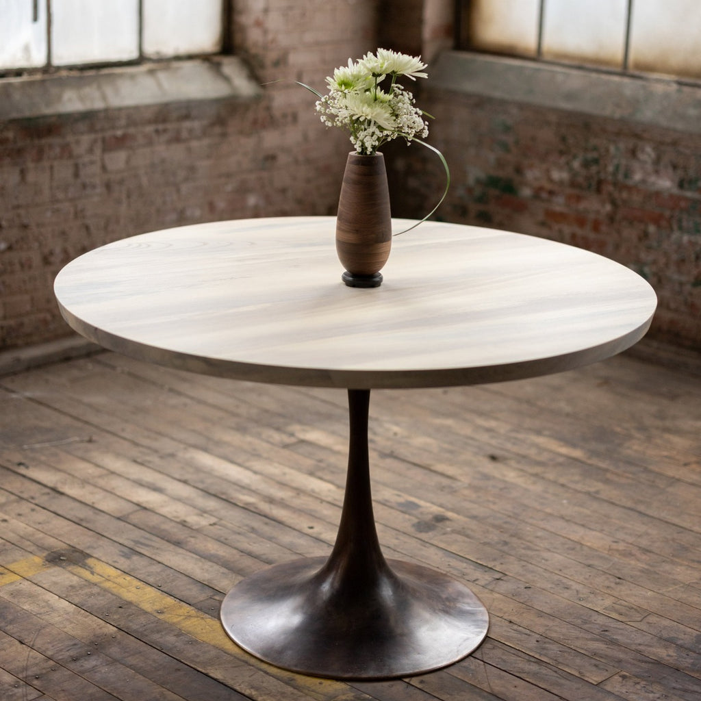 Round Wood and Bronze Pedestal Base Dining Table with Vase