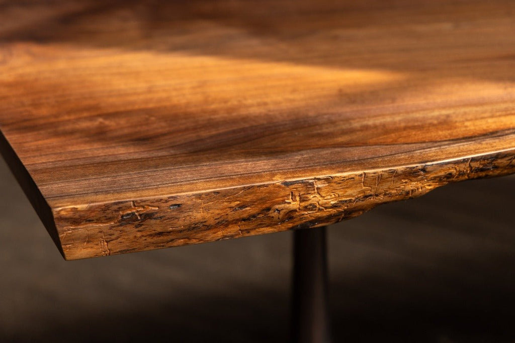 close up of live edge of wood dining table