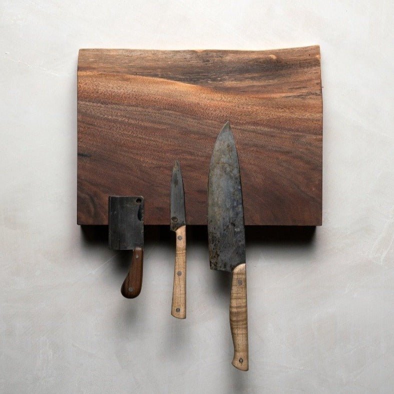 Magnetic Wooden Knife Holder holding kitchen knives
