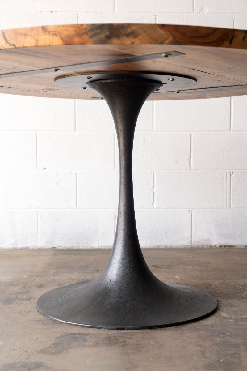 black round pedestal dining table