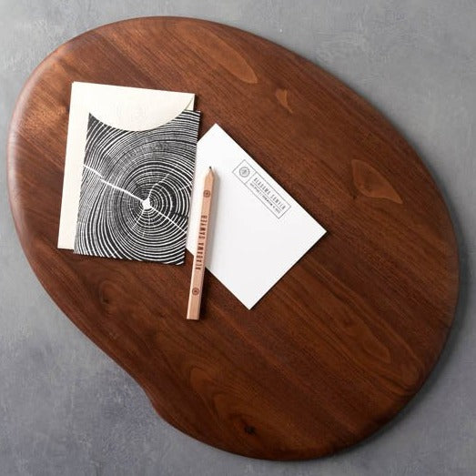 Wooden Lap Desk viewed from above with a greeting card and pencil